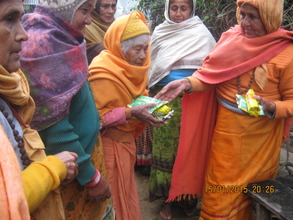 The women receiving gifts.