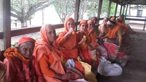 The holy women have some  drinks