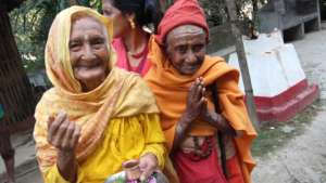 Two old women ready to welcome guests