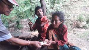 SESF chairman   giving  the money to  disabled.