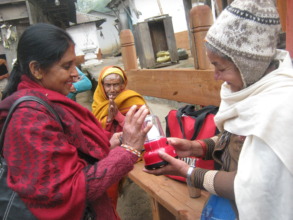 An old age woman receiving an lantern