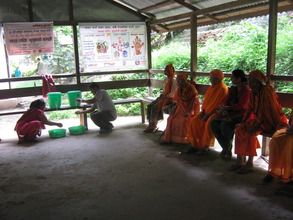 Health  worker  teaching personal hygiene.