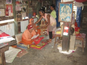 Elderly people receiving blessings.