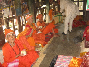 Organization chairman distributing biscuits