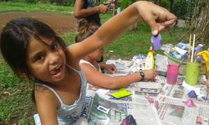 children making things with recycling materials
