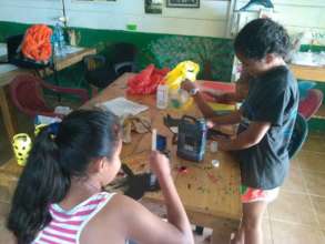 Children working with recycled materials