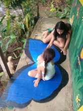 Children working on their costumes