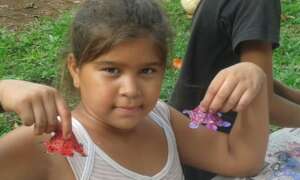 Children learning to make art from recycling