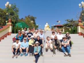 The group learning about local customs