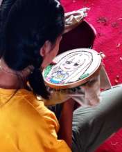 A participant and her beautiful embroidery