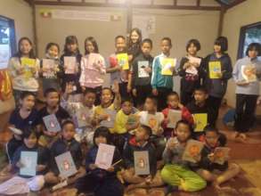 Happy kids with new stationary