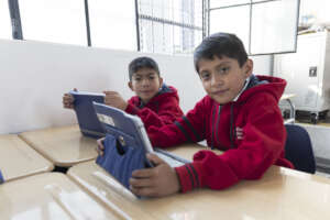 Students working on their tablets.