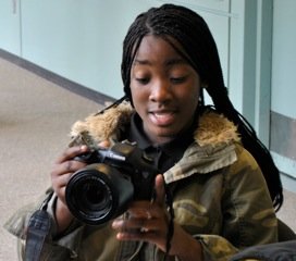 Amirah practices her camera skills at WHYY