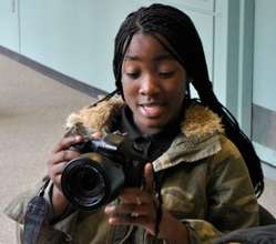 Amirah practices her camera skills at WHYY