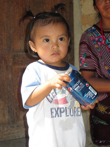 participant's baby sister intrigued by home visit