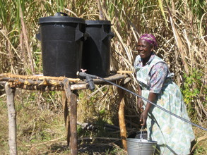 Granny fills her drip irrigation kit