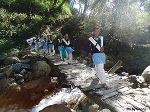 School girls walking on a newly constructed bridge