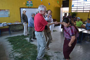 Board members and beekeepers celebrate the harvest