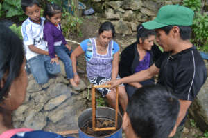 Genaro training beekeepers in Huehuetenango