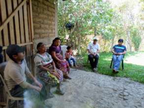 Genaro (left) addresses the group