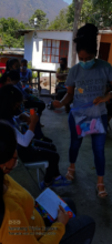 Vilma handing out soap for menstrual hygiene