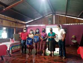 Leaders at workshop on raising chickens