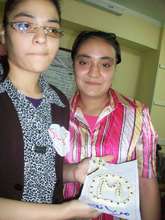 Girls show off hands-on crafts on training topic