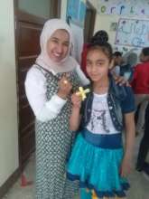 Valuable girl sisters make Palm Sunday crafts