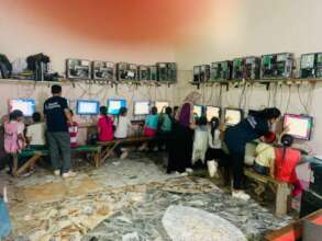 Little Sisters Learning Computer Skills
