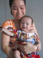 7 month old An and mom, post-surgery, 2013