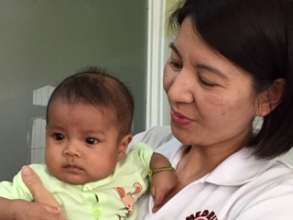 Sweet Little One with MEDRIX Staff Member