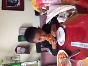 Successful surgery 5 years ago-enjoying his Pizza