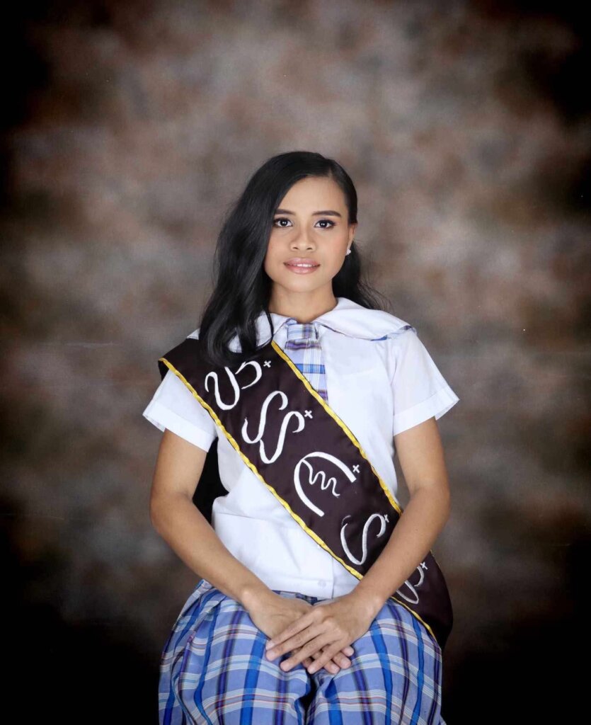 The confident smiling student