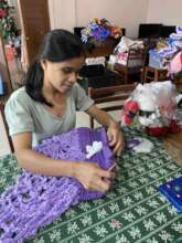Crocheting clothes and flowers