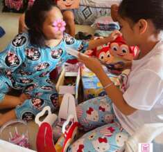Girls packing gift bags