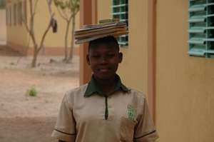 A girl going to class from the foyer