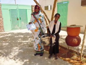 Mother and daughter with a Berkeley-Darfur Stove