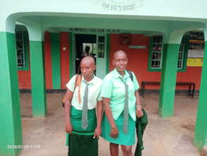 Sarah with her friend on school opening day.