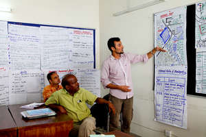 Presenting group work. Copyright RedR/GMB Akash
