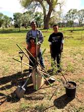 A family receives their fruit trees in New Mexico