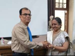 Being felicitated by the Head of the Department