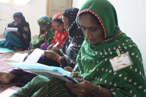 In the Sughar Center women learning to write