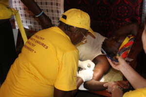 CHAT Nurse providing an implant drng Door to Door