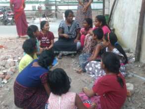 Small group Snehidhi meeting in a slum
