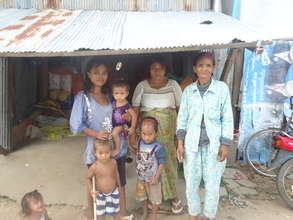 Cambodian family in their community