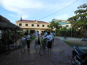 Children using the bicycles we donated last year