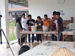 students presenting making eco enzymes and Jakaba