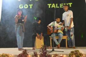 TLF students are performing music as Merdeka Class