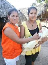 Marta, Health Promoter with Yovana and Luis