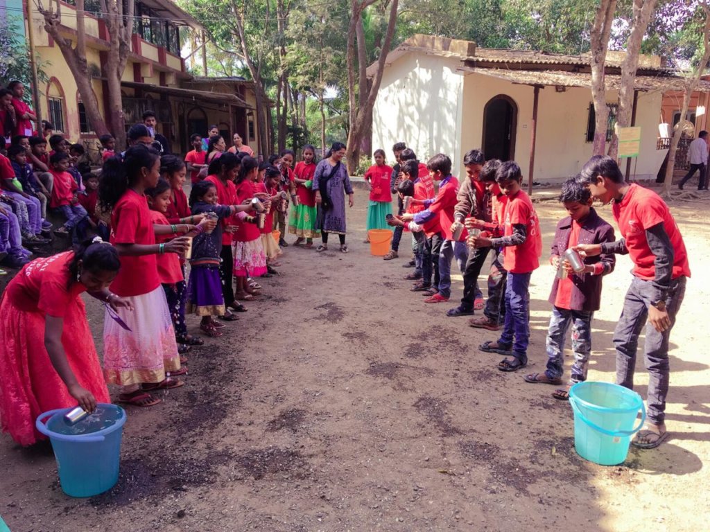 Children enjoying games at annual camp